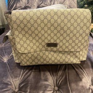 Authentic Gucci diaper bag. Used once. Retails for $1900